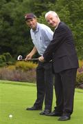 2 July 2003; Irish Golfer Padraig Harrington gives Gerry McQuaid, Commericial Director O2 Ireland, some golf lessons at the announcment that O2 Ireland has become official sponsor of the European Ryder Cup Team for the 2004 & 2006 Ryder Cup at the K Club in Straffan, Kildare. Photo by David Maher/Sportsfile