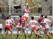 28 April 2013; Ryan Bell, Derry, claims a high ball in midfield. Allianz Football League Division 2 Final, Derry v Westmeath, Croke Park, Dublin. Picture credit: Oliver McVeigh / SPORTSFILE
