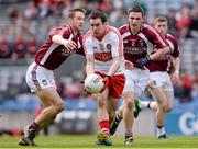 28 April 2013; Benny Heron, Derry, in action against Kevin Maguire, left, and Mark McCallon, Westmeath. Allianz Football League Division 2 Final, Derry v Westmeath, Croke Park, Dublin. Picture credit: Ray McManus / SPORTSFILE