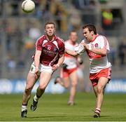 28 April 2013; Ger Egan, Westmeath, in action against Barry Heron,  Derry. Allianz Football League Division 2 Final, Derry v Westmeath, Croke Park, Dublin. Picture credit: Oliver McVeigh / SPORTSFILE