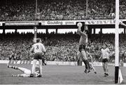21 August 1977; Paddy Cullen, Dublin, catches the ball watched by team-mates Sean Doherty, 3, and Kevin Moran, right, and Sean Walsh, 14, Kerry. GAA Football All-Ireland Senior Championship Semi-Final, Dublin v Kerry, Croke Park, Dublin. Picture credit: Connolly Collection / SPORTSFILE