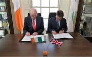 7 May 2013; President of the Olympic Council of Ireland Pat Hickey, left, and Lord Coe, Chairman of the British Athletic Association, signing an agreement between Olympic Council of Ireland and British Olympic Association. Olympic House, Howth, Co. Dublin. Picture credit: Brendan Moran / SPORTSFILE