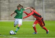 8 May 2013; Jamie Finn, Republic of Ireland, in action against Charlotte Van Ishoven, Belgium. Women's U16 Development Tournament, Republic of Ireland v Belgium, Frank Cooke Park, Dublin. Picture credit: Stephen McCarthy / SPORTSFILE