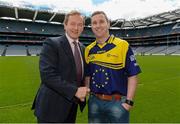 9 May 2013; An Taoiseach Enda Kenny T.D, Tánaiste Eamon Gilmore T.D, and Minister of State for European Affairs Lucinda Creighton T.D, today led a national handshake in Croke Park, as part of Ireland’s EU Presidency celebrations of Europe Day. They were participating in a group handshake with a team of young GAA players, aged between 10 to 13, from community clubs around Ireland, whose families originated in other European countries. The young players, sporting a specially designed GAA Europe strip were welcomed to Croke Park by Uachtarán Chumann Lúthchleas Gael Liam Ó Néill and Ard Stiúrthóir of the GAA Páraic Duffy. The hand shake was replicated in national schools around the country where pupils wished each other a ‘Happy Europe Day’, acknowledging the diversity and solidarity that exists between them as EU citizens. Pictured are An Taoiseach Enda Kenny T.D. with Mayo footballer Michael Conroy. Croke Park, Dublin. Picture credit: Brian Lawless / SPORTSFILE