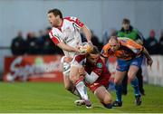 10 May 2013; Darren Cave, Ulster, is tackled by George North, Llanelli Scarlets. Celtic League Play-off, Ulster v Llanelli Scarlets, Ravenhill Park, Belfast, Co. Antrim. Picture credit: Oliver McVeigh / SPORTSFILE