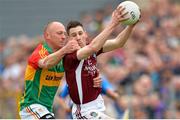 19 May 2013; James Dolan, Westmeath, in action against Paul Reid, Carlow. Leinster GAA Football Senior Championship, First Round, Westmeath v Carlow, Cusack Park, Mullingar, Co. Westmeath. Picture credit: Matt Browne / SPORTSFILE
