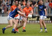 19 May 2013; Ciaran McKeever, Armagh, in action against Martin Reilly, Cavan. Ulster GAA Football Senior Championship, Preliminary Round, Cavan v Armagh, Kingspan Breffni Park, Cavan. Picture credit: Oliver McVeigh / SPORTSFILE