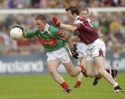 6 July 2003; Mayo's Alan Dillon is tackled by Galway's Jarlath Fallon. Bank of Ireland Connacht Senior Football Championship Final, Galway v Mayo, Pearse Stadium, Galway. Picture credit; Damien Eagers / SPORTSFILE *EDI*