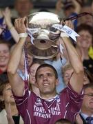 6 July 2003; Galway captain Kevin Walsh lifts the Nestor Cup after victory over Mayo. Bank of Ireland Connacht Senior Football Championship Final, Galway v Mayo, Pearse Stadium, Galway. Picture credit; David Maher / SPORTSFILE *EDI*