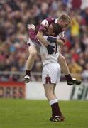 6 July 2003; Ciaran McGrath, Galway minors, celebrates with his team-mate Brian Donnellan at the end of the game after victory over Mayo minors. Connacht Football Championship Minor Final, Galway v Mayo, Pearse Stadium, Galway. Picture credit; David Maher / SPORTSFILE *EDI*