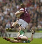 6 July 2003; Matthew Clancy, Galway, in action against Mayo's Conor Mortimer. Bank of Ireland Connacht Senior Football Championship Final, Galway v Mayo, Pearse Stadium, Galway. Picture credit; David Maher / SPORTSFILE *EDI*