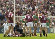 6 July 2003; Referee Michael Monahan, hidden, shows the red card to Fergal Kelly, third from right, during the closing stages of the game. Bank of Ireland Connacht Senior Football Championship Final, Galway v Mayo, Pearse Stadium, Galway. Picture credit; David Maher / SPORTSFILE *EDI*