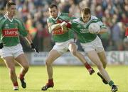 19 July 2003; Fermanagh's Paul Brewster in action against Mayo's Kenneth Mortimer and Gary Mullins. Bank of Ireland Senior Football Championship qualifier, Mayo v Fermanagh, Markievicz Park, Sligo. Picture credit; Damien Eagers / SPORTSFILE *EDI*