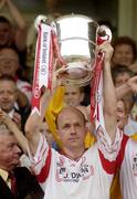 20 July 2003; Tyrone captain Peter Canavan lifts the Anglo Cent Cup after victory over Down. Bank of Ireland Ulster Senior Football Championship Final replay, Down v Tyrone, St. Tighearnach's Park, Clones, Co Monaghan. Picture credit; Brendan Moran / SPORTSFILE *EDI*