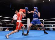 2 June 2013; Sean McComb, right, Ireland, exchanges punches with Pavlo Ischenko, Ukraine, during their Lightweight 60Kg bout. EUBC European Men's Boxing Championships 2013, Minsk, Belarus. Photo by Sportsfile