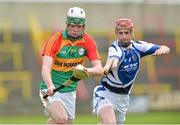 2 June 2013; Marty Kavanagh, Carlow, who will be starting his leaving cert on Wednesday in action against John Delaney, Laois. Leinster GAA Hurling Senior Championship, Quarter-Final, Laois v Carlow, O'Moore Park, Portlaoise, Co. Laois. Picture credit: Matt Browne / SPORTSFILE