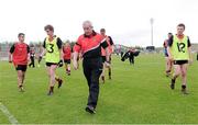 2 June 2013; Pete McGrath, Dow Manager, and former Down All Ireland Senior winning manager leads his team in after the team warm up. Electric Ireland Ulster GAA Football Minor Championship, Quarter-Final, Derry v Down, Celtic Park, Derry. Picture credit: Oliver McVeigh / SPORTSFILE