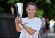 3 June 2013; Siobhan O'Doherty, from Tipperary, celebrates with the trophy after winning the Flora Women's Mini Marathon 2013. St. Stephen's Green, Dublin. Picture credit: Barry Cregg / SPORTSFILE