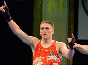 4 June 2013; Jason Quigley, Ireland, is declared the winner over Arbi Chakaev, Austria, after their 75kg Middleweight bout. EUBC European Men's Boxing Championships 2013, Minsk, Belarus. Photo by Sportsfile