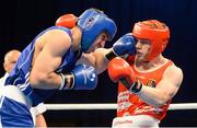 4 June 2013; Arbi Chakaev, left, Austria, exchanges punches with Jason Quigley, Ireland, during their 75kg Middleweight bout. EUBC European Men's Boxing Championships 2013, Minsk, Belarus. Photo by Sportsfile