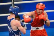 4 June 2013; Bogdan Shelestyuk, right, Ukraine, exchanges punches with Adam Nolan, Ireland, during their 69kg Welterweight bout. EUBC European Men's Boxing Championships 2013, Minsk, Belarus. Photo by Sportsfile