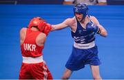 4 June 2013; Adam Nolan, right, Ireland, exchanges punches with Bogdan Shelestyuk, Ukraine, during their 69kg Welterweight bout. EUBC European Men's Boxing Championships 2013, Minsk, Belarus. Photo by Sportsfile