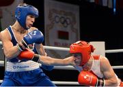 5 June 2013; Michael Conlan, left, Ireland, exchanges punches with Siarhei Loban, Belarus, during their 52kg Flyweight quarter-final bout. EUBC European Men's Boxing Championships 2013, Minsk, Belarus. Photo by Sportsfile