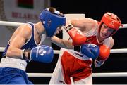 5 June 2013; Michael Conlan, left, Ireland, exchanges punches with Siarhei Loban, Belarus, during their 52kg Flyweight quarter-final bout. EUBC European Men's Boxing Championships 2013, Minsk, Belarus. Photo by Sportsfile