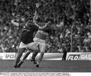2 September 1984; Cork's Seanie O'Leary in action against Offaly's Eugene Coughlan. All-Ireland Hurling Final, Cork v Offaly, Semple Stadium, Thurles. Picture credit; Ray McManus/SPORTSFILE