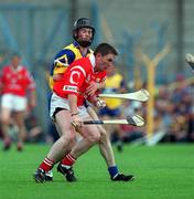 4 July 1999; Michael O'Connell, Cork, in action against Danny Scanlon, Clare. Cork v Clare, Munster Senior Hurling Final, Semple Stadium, Thurles. Picture credit; Brendan Moran/SPORTSFILE