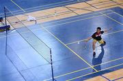 Nhat Nguyen during a badminton training session *** Local Caption *** Nhat Nguyen during a badminton training session