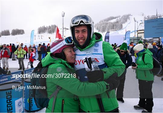 11 March 2025; Coach Jill Sloan greets Clive Healy of Team Ireland, a member of Waterford Special Olympics Club, Waterford City, after the 'Divisional rounds' in the Alpine Skiing event during day three of the Turin 2025 Special Olympics World Winter Games in Sestriere, Italy, Italy. Photo by Ray McManus/Sportsfile